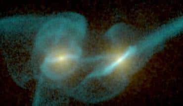 This frame of the computer simulation shows the galaxies as they appear now (Photo&colon; University of Hawaii)