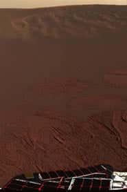 The first colour images show the edges of the crater in which Opportunity landed