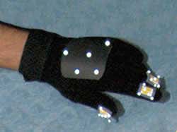 The reflective gloves turn the users hand into a 'Swiss Army knife' for manipulating data  