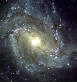 'Perfect' spiral galaxy may harbour dark secret