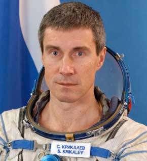 Cosmonaut clocks up record time in space