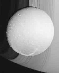 Another of Cassini's images frames Dione against Saturn's rings