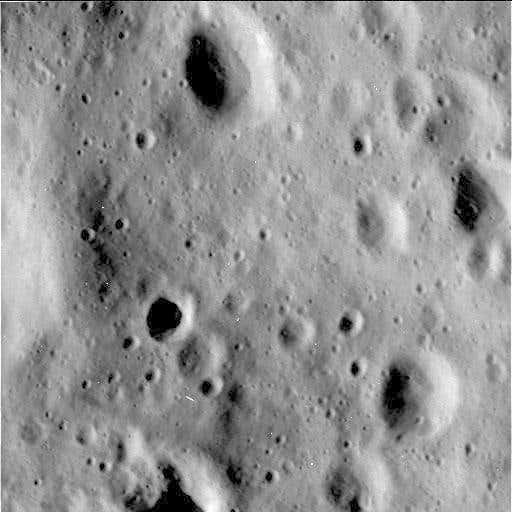 The heavily cratered surface of Rhea was snapped from a distance of 500 kilometres 