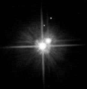 Pluto's moons share a family resemblance