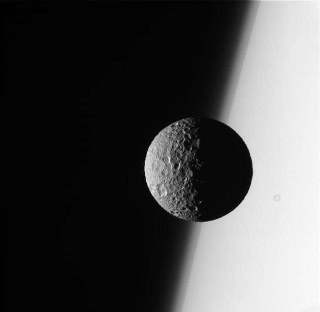 Mimas hangs peacefully in front of Saturn (NASA/JPL/Space Science Institute)
