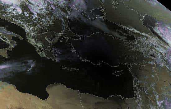 The Moon's shadow is cast over the Sahara Desert in this image taken by the Meteosat Second Generation channel 2, a geostationary meteorological satellite