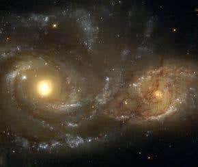 Colossal black holes seen in closest clinch yet