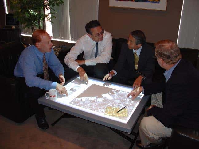 Interactive display system knows users by touch