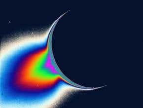 Did Saturn's volcanic moon roll with it?