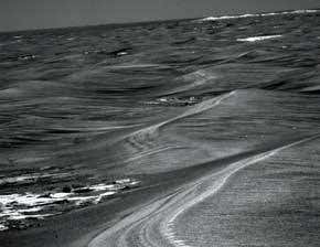 One Mars rover gets stuck in, the other chills out