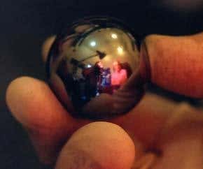 Mini solar system could reveal hidden dimensions