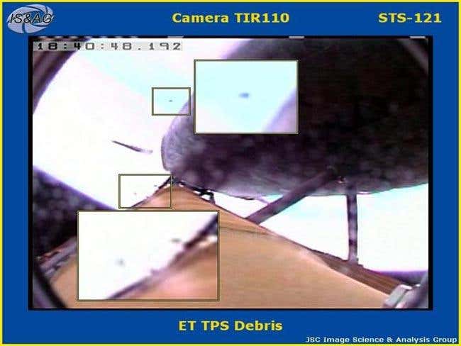 Cameras onboard the shuttle captured very small pieces of external tank foam falling during launch 