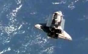 Shuttle docks in orbit – now the real work begins