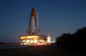 Shuttle Discovery rolls out to launch pad
