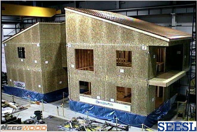 Artificial earthquake batters replica house