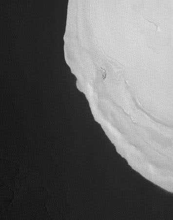 This mound of water ice, sometimes referred to as a frozen lake, was first found at the bottom of a crater by ESA's Mars Express spacecraft. The new MRO image is detailed enough to reveal the texture of the ice