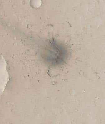 This 24-metre-wide crater was first spotted in December 2003. It was not present in an earlier image from April 2001 