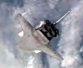 Shuttle successfully docks with space station