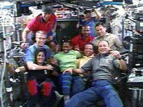 Astronauts do shuttle inspection on the fly