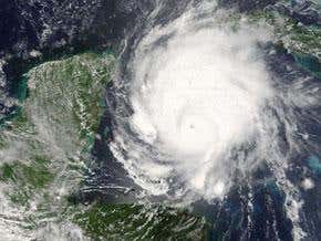 Global warming link to hurricanes likely but unproven