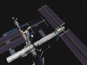 NASA wiggles space station's stuck solar array