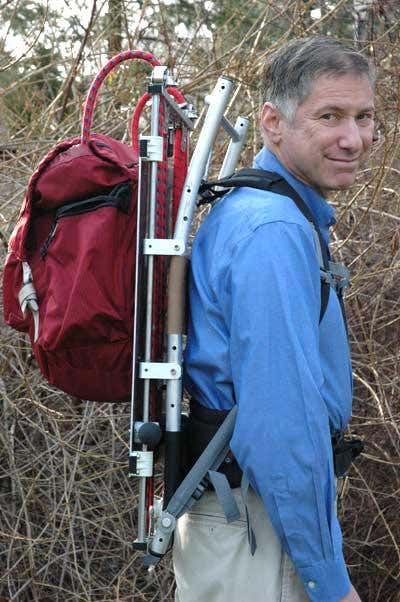 The backpack, worn by Rome, reduces the energy needed to carry heavy loads by around 40W