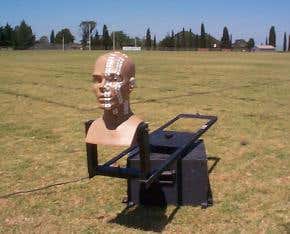 Mannequin sunbathes for safety's sake