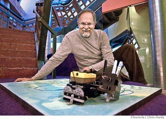 Max Chandler gets along just fine with his robot helpers when they are behaving properly