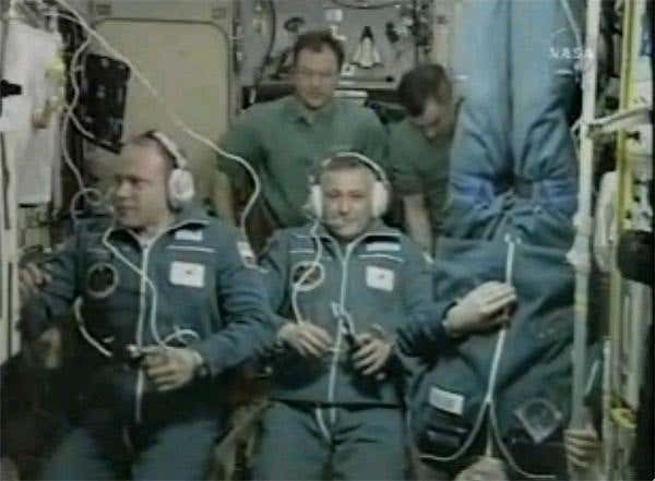 Space tourist Charles Simonyi shows off his space legs after arriving on the ISS 