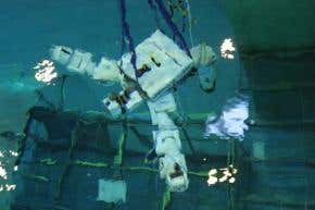 Three-armed robot to work on space station