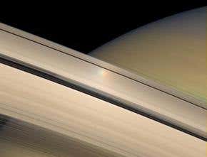 Saturn's rings hide 'sunflowers' and extra bulk