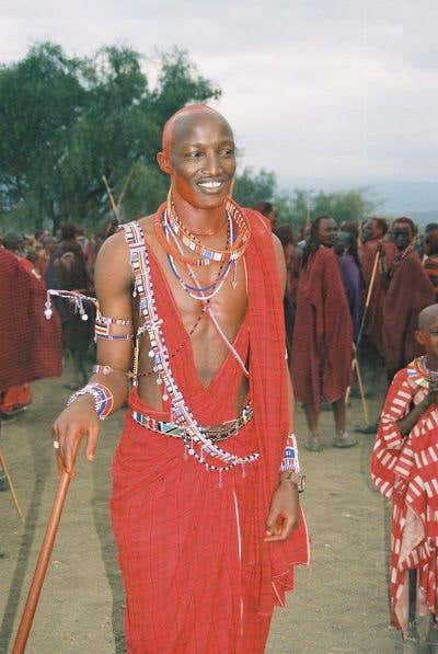 Young Masai warriors traditionally dress in red finery