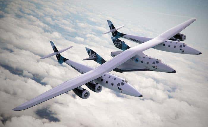 White Knight Two will carry SpaceShipTwo slung beneath its belly to an altitude of about 15 km before SpaceShipTwo fires its engine to reach space. White Knight Two boasts two passenger cabins, while the original White Knight - used during SpaceShipOne's X Prize-winning flights in 2004 - had only one (Illustration: Virgin Galactic)