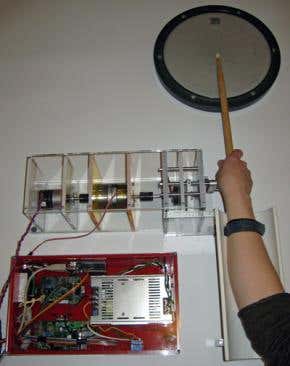 Robotic drumstick keeps novices on the beat