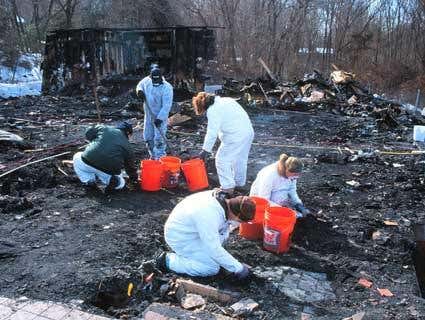 FAR volunteers locating evidence at the scene of The Station nightclub fire
