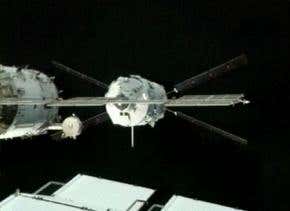Robotic cargo ship docks flawlessly with space station