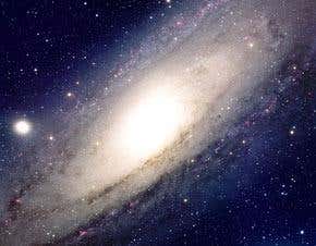 Galaxies' spiral arms may betray black holes' weight