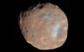 'Doomed' Mars moon imaged in stunning detail