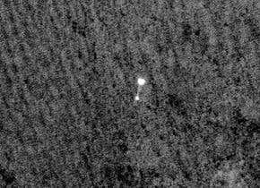 Spacecraft spies probe parachuting to Martian surface