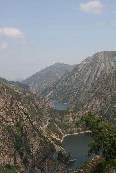 One of the structures of the Ibero-Armorican Arc in Asturias, northern Spain. The rocks are Ordovician in age, around 475 million years ago, and the stresses resulted in the collision strained their originally horizontal shape into the concave 