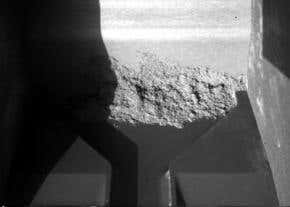 Phoenix's first ice study foiled by sticky Mars dirt