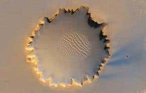 Mars rover clambers out of Victoria Crater