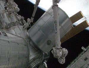 Shuttle astronauts deliver space station's new gear