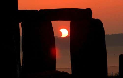 A partial solar eclipse seen from Stonehenge, UK on 31 May 2003 