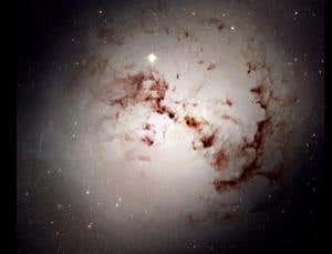 Universe lit by dust-swaddled galaxies