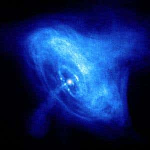 A snapshot from a movie showing dynamic rings, wisps and jets of matter and antimatter around the pulsar in the Crab Nebula. The inner ring is about one light year across 