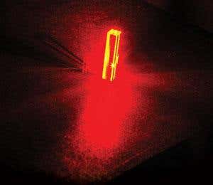 This crystal is a scintillator. When a high energy charged particle or photon passes through it, it glows. Scintillators are used in Positron Emission Tomography (PET), a type of medical imaging that monitors the regions of energy use in the body 