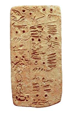 Linear A script etched into a clay tablet