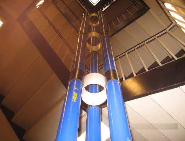 A 7-metre-tall demonstration tower stands in a stairwell 