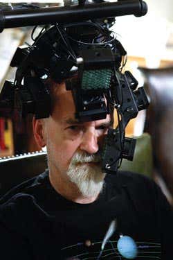 Terry Pratchett wearing the laser helmet. After Pratchett was diagnosed with Alzheimers in 2007, he wore this helmet in the hope that it would help repair brain cells by penetrating the skull with light